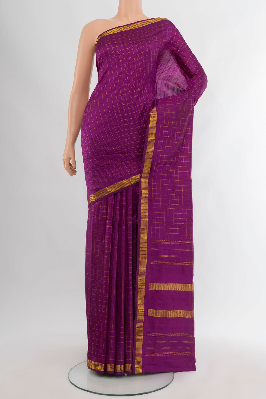 Purple Kanjivaram Silk Saree with Checked design on the body and Zari Border.  displayed on a mannequin