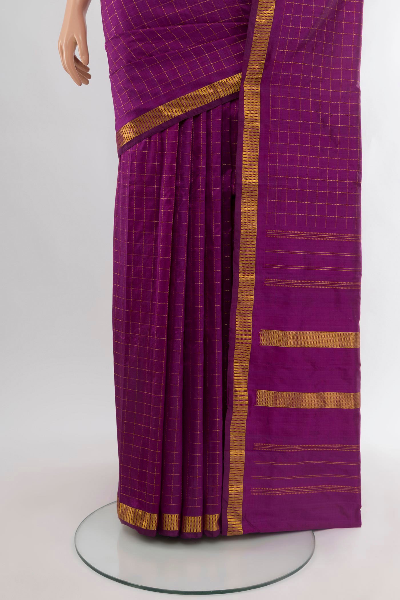 Pleats and pallu of Purple Kanjivaram Silk Saree with Checked design on the body and Zari Border. 