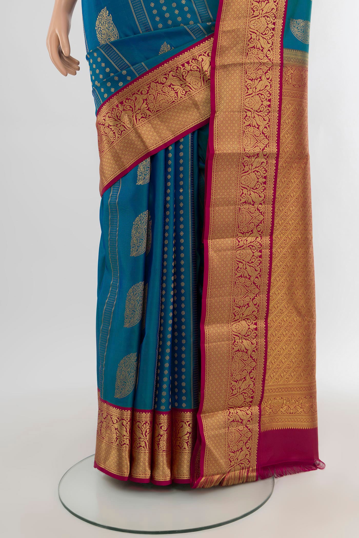 Pleats and pallu of Blue Kanjivaram Silk Saree with Zari Butta on the body and Zari Border. 