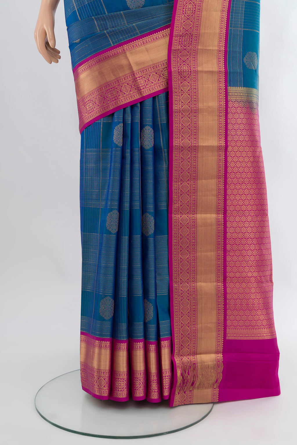 Pleats and pallu of Royal Blue Kanjivaram Silk Saree with Zari Butta on the body and Zari Border. 