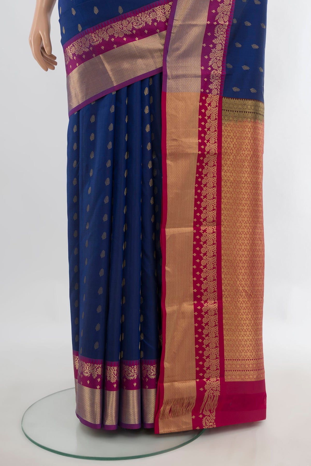 Pleats and pallu of Pure Silk Blue Kanchipuram Saree with Zari Butta on the body and Zari Border. 