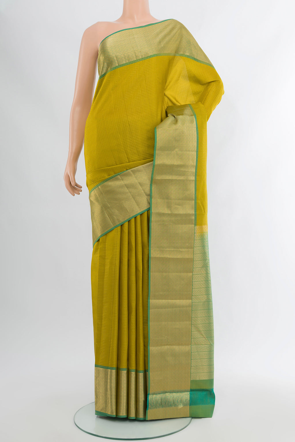 Parrot Green Kanchipuram Silk Saree with Plain Body and Zari Border.  displayed on a mannequin