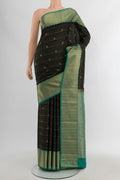 Black Kanjivaram Silk Saree with Checked design on the body and Zari Border.  displayed on a mannequin