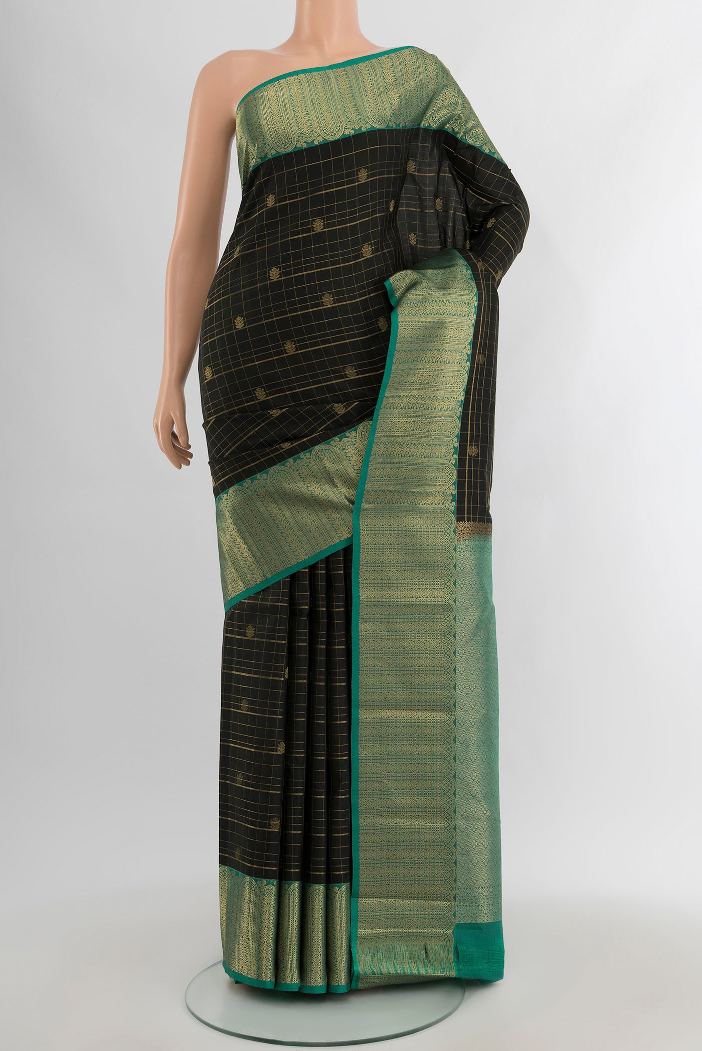 Black Kanjivaram Silk Saree with Checked design on the body and Zari Border.  displayed on a mannequin