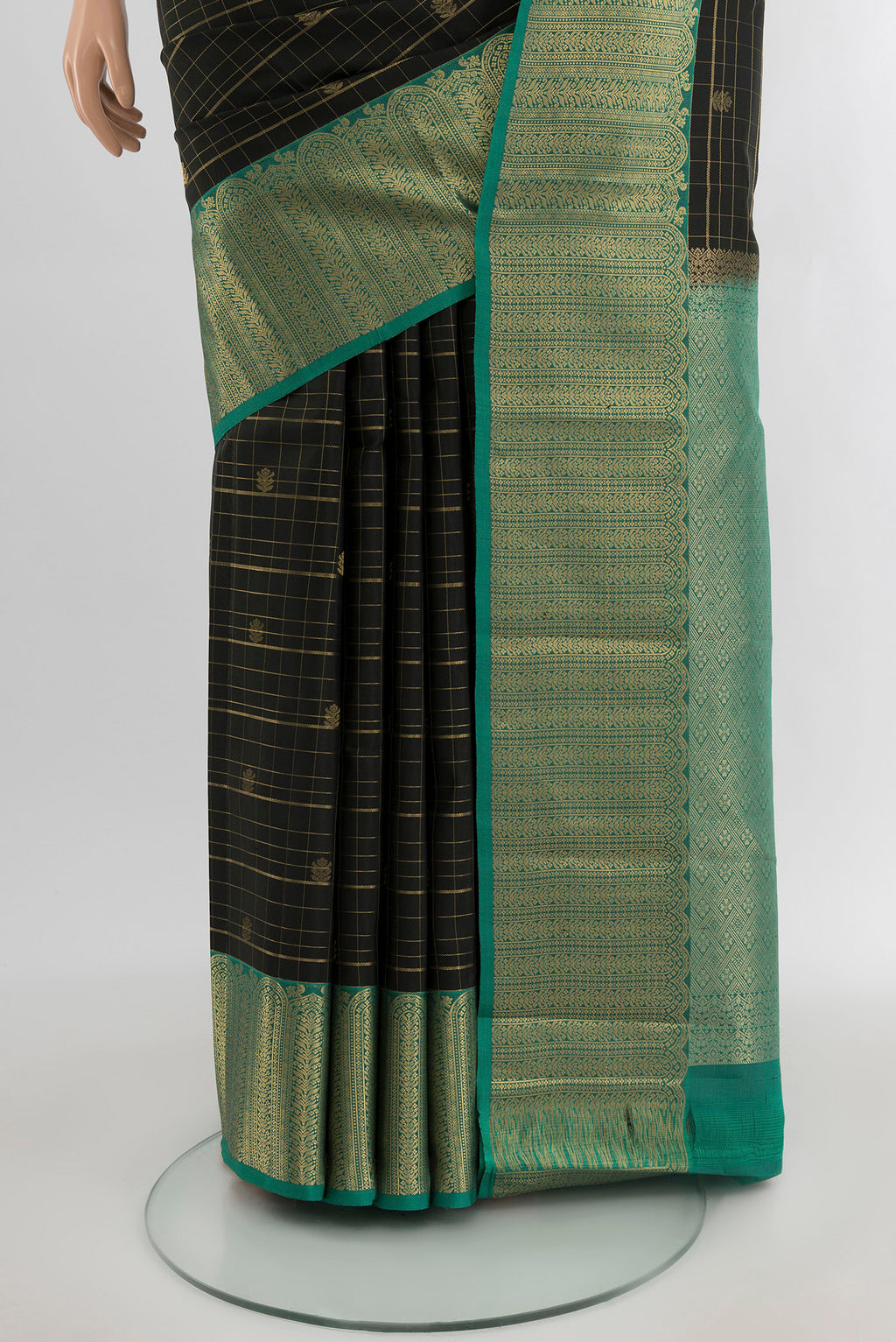 Pleats and pallu of Black Kanjivaram Silk Saree with Checked design on the body and Zari Border. 