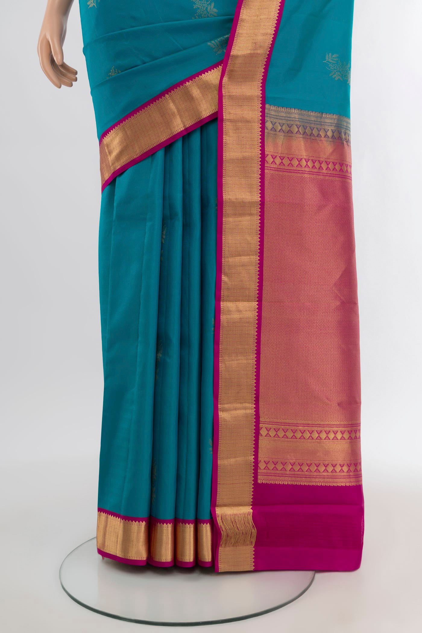 Pleats and pallu of Blue Kanchipuram Silk Saree with Zari Butta on the body and Zari Border. 