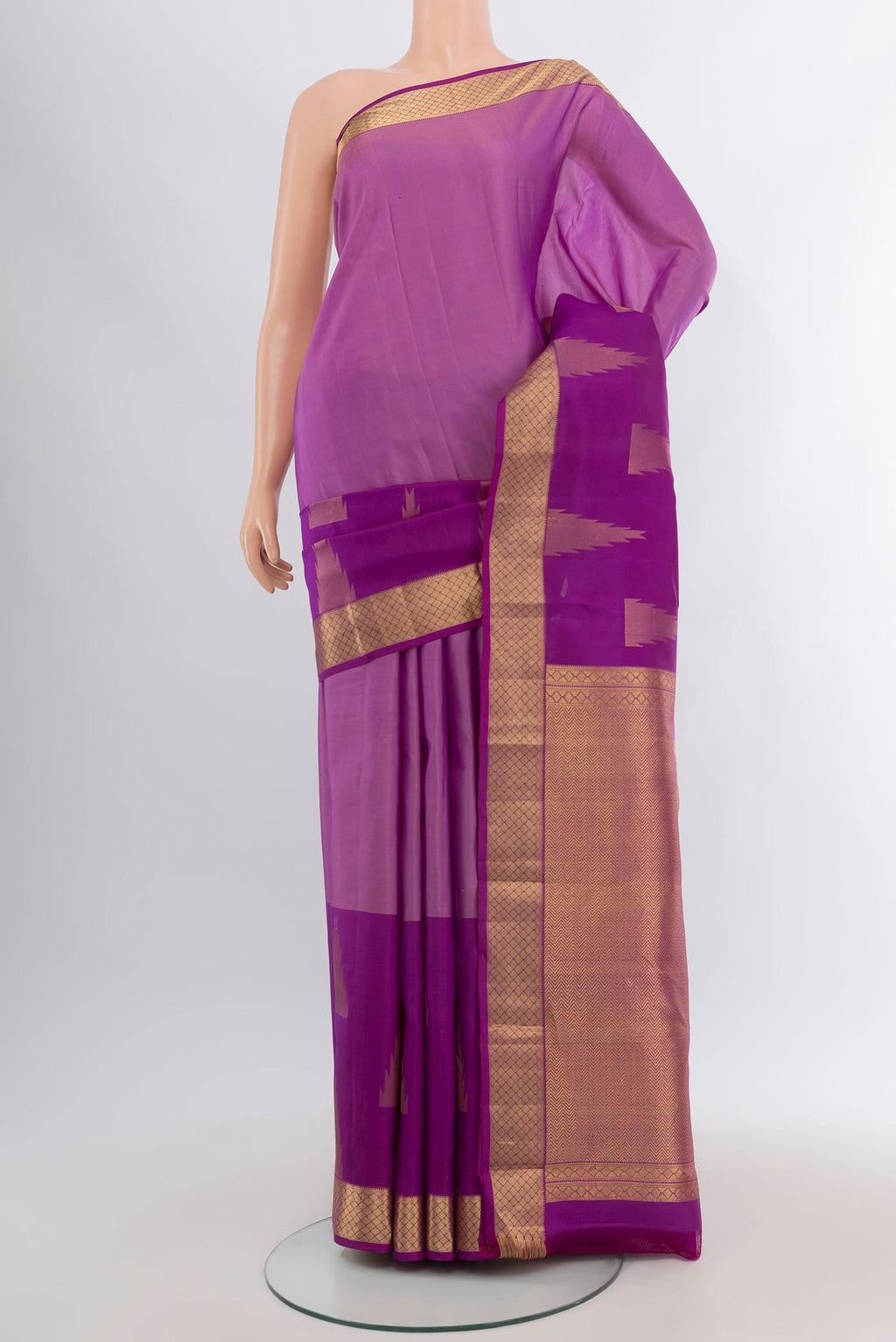Lavender Kanchipuram Silk Saree with Plain Body and Zari Border.  displayed on a mannequin