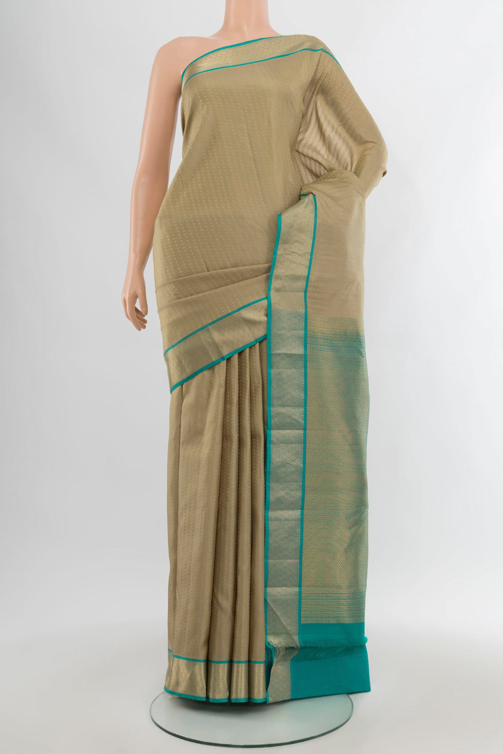 Grey Kanchipuram Silk Saree with Zari Butta on the body and Zari Border.  displayed on a mannequin
