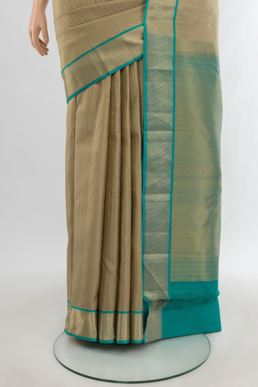 Pleats and pallu of Grey Kanchipuram Silk Saree with Zari Butta on the body and Zari Border. 