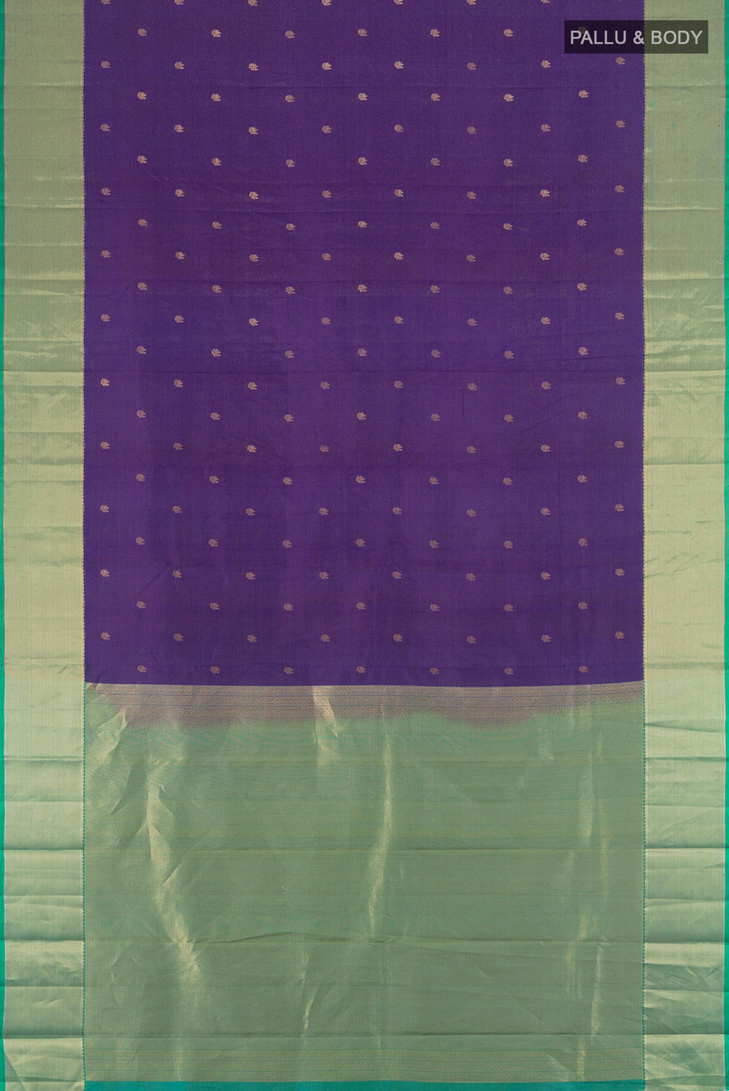Flat view of Violet Kanjivaram Silk Saree with Zari Butta on the body and Zari Border. 