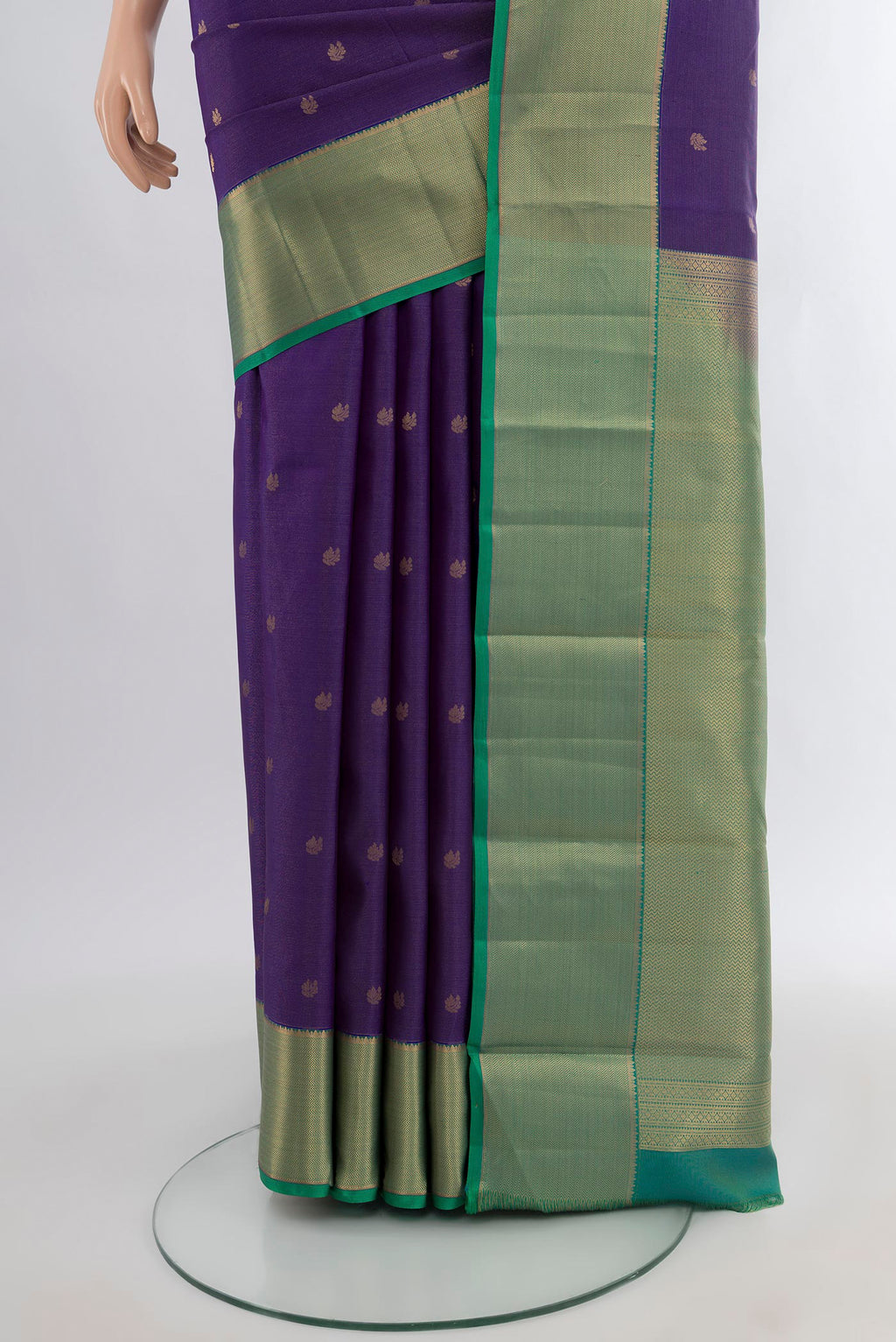 Pleats and pallu of Violet Kanjivaram Silk Saree with Zari Butta on the body and Zari Border. 