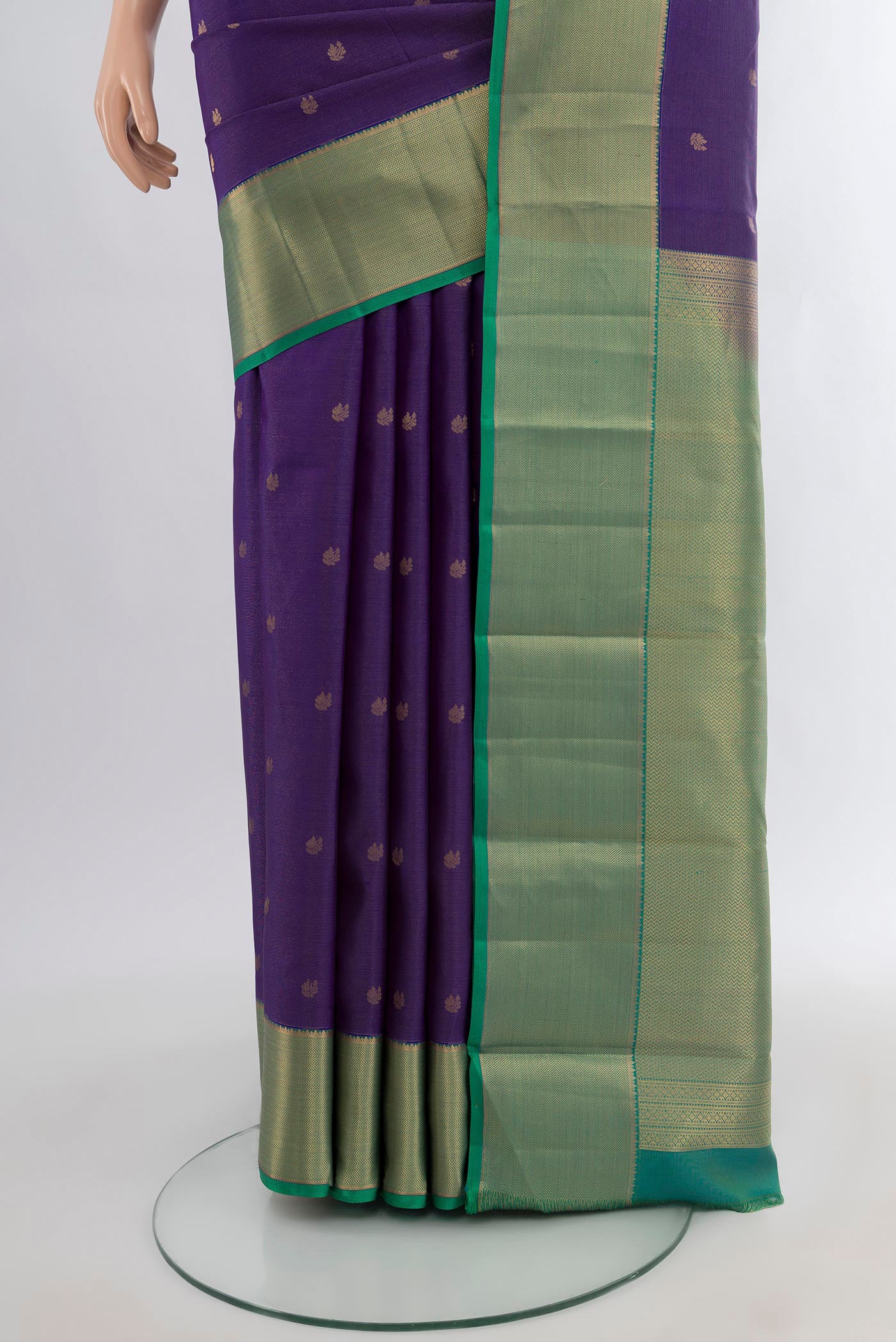 Pleats and pallu of Violet Kanjivaram Silk Saree with Zari Butta on the body and Zari Border. 
