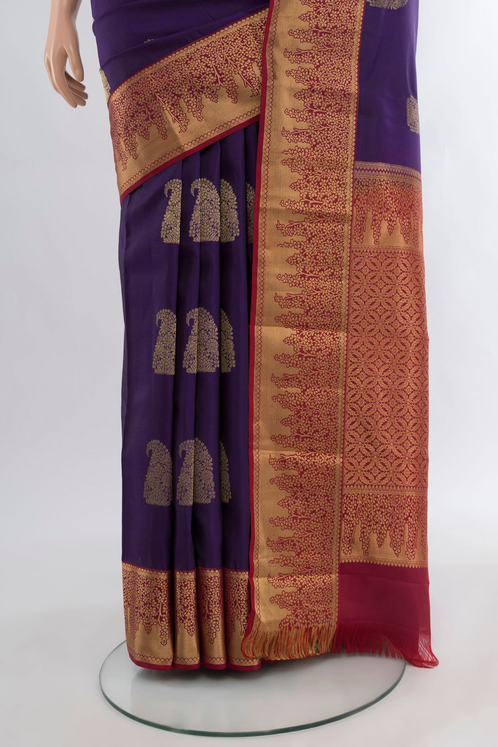 Pleats and pallu of Violet Kanjivaram Silk Saree with Zari Butta on the body and Zari Border. 