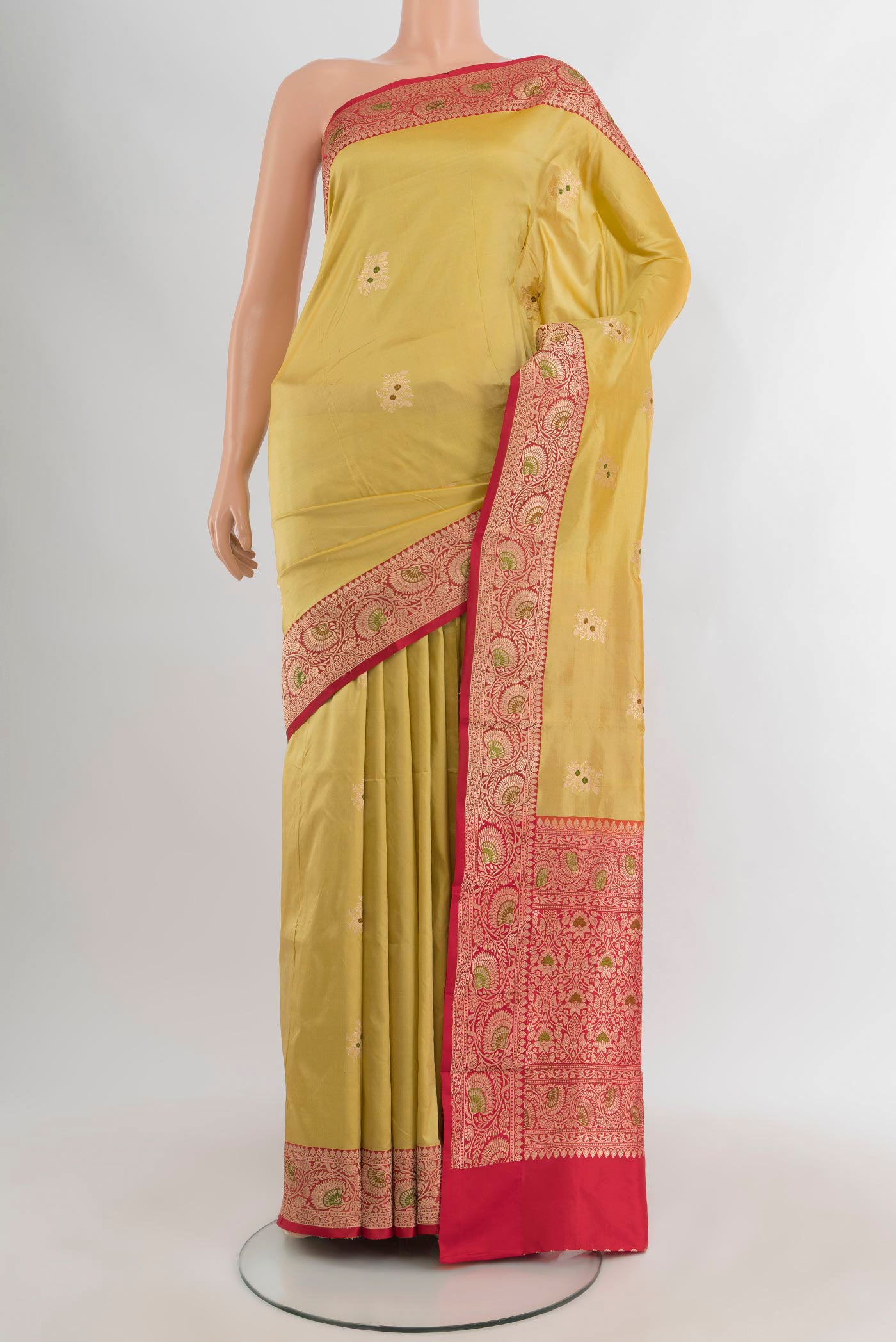 Sandal Banarasi Katan Silk Saree with Zari Butta on the body and Zari Border.  displayed on a mannequin