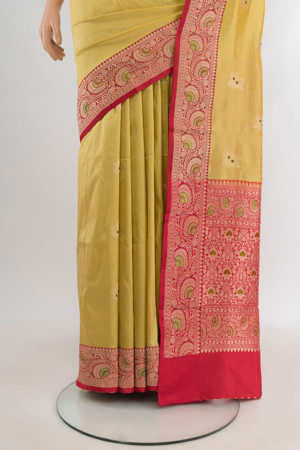 Pleats and pallu of Sandal Banarasi Katan Silk Saree with Zari Butta on the body and Zari Border. 