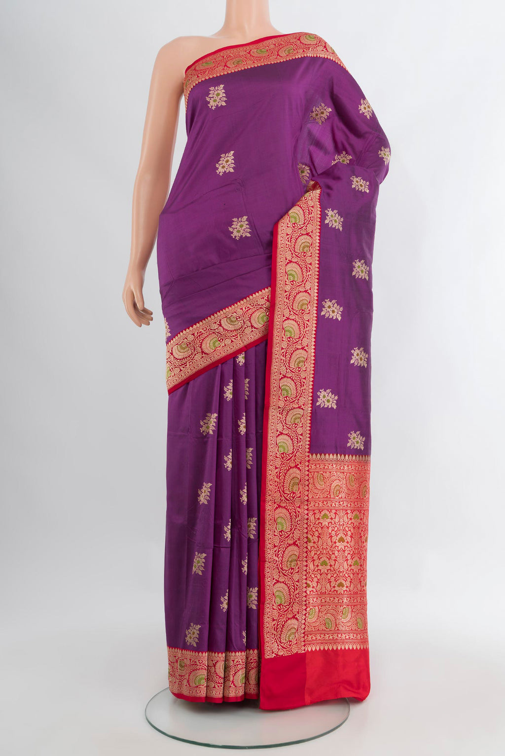 Purple Banarasi Katan Silk Saree with Zari Butta on the body and Zari Border.  displayed on a mannequin