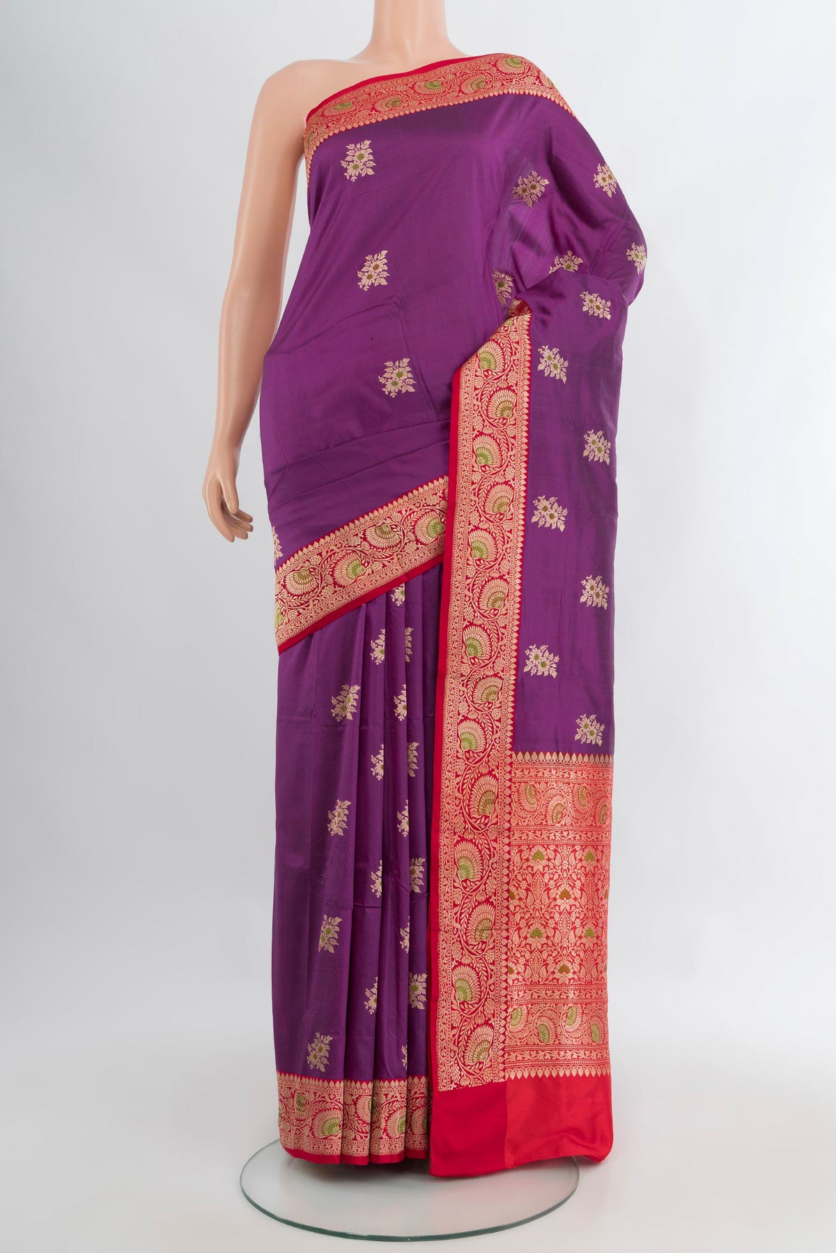 Purple Banarasi Katan Silk Saree with Zari Butta on the body and Zari Border.  displayed on a mannequin