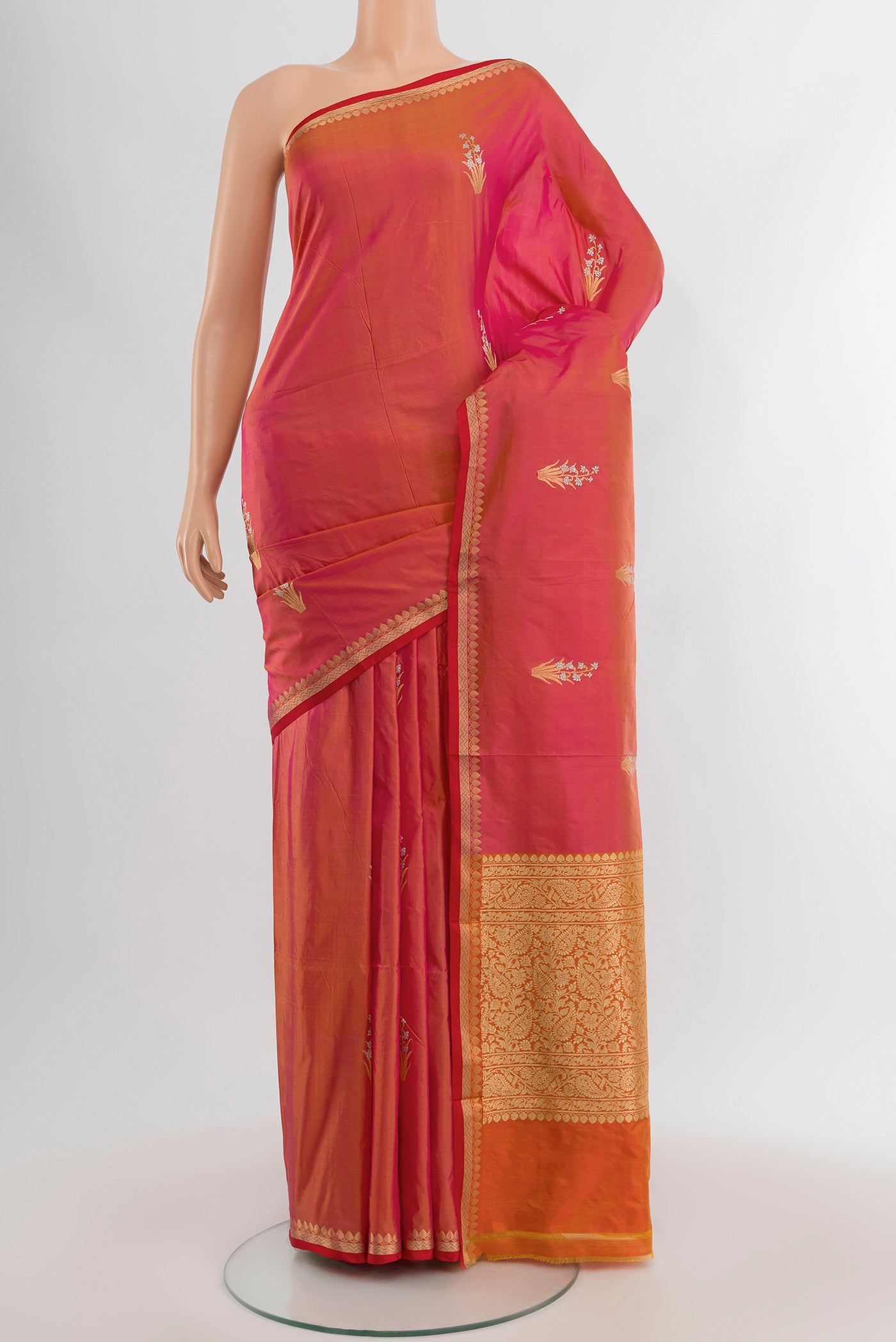 Pink Banarasi Katan Silk Saree with Zari Butta on the body and Zari Border.  displayed on a mannequin