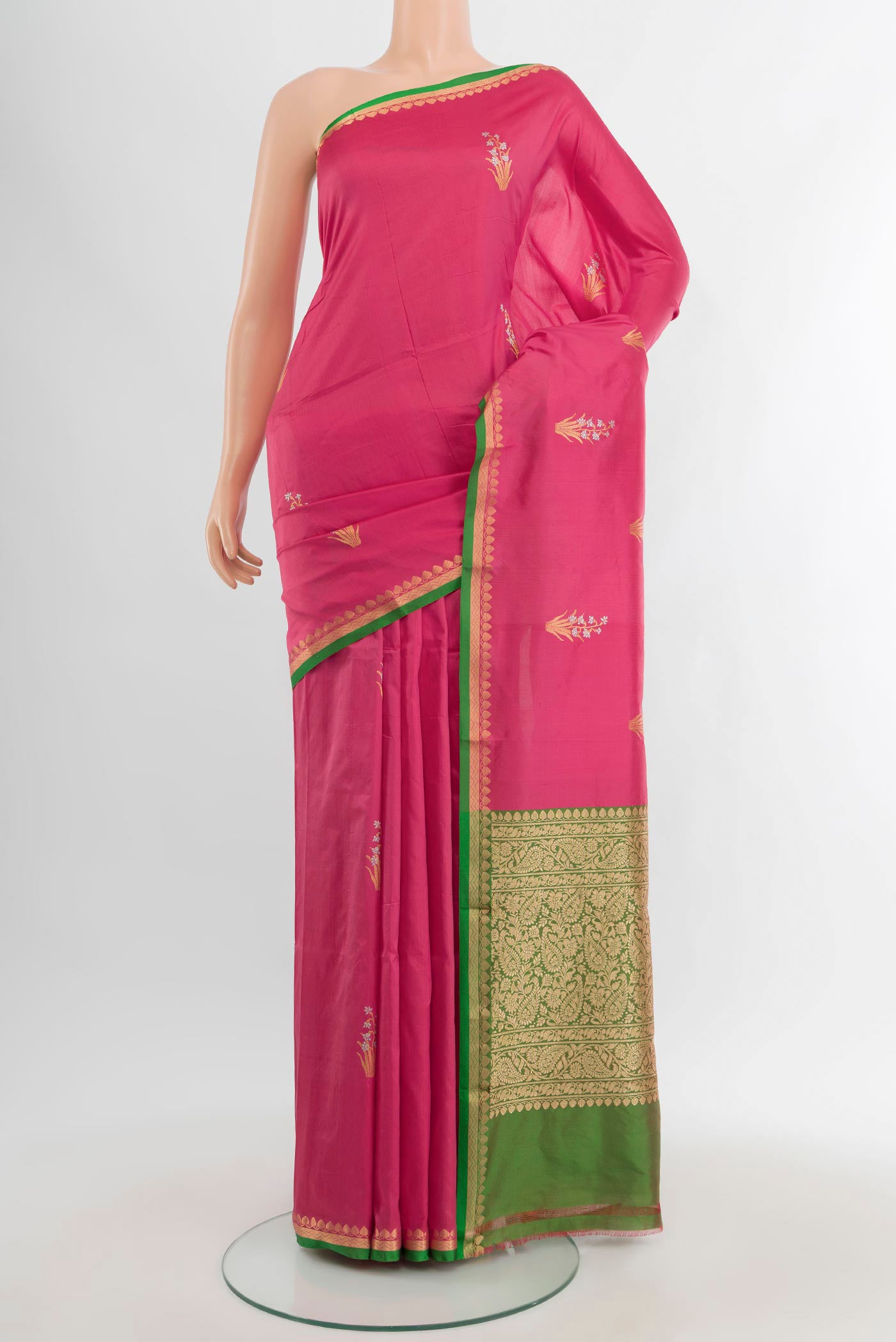 Pink Banarasi Katan Silk Saree with Zari Butta on the body and Zari Border.  displayed on a mannequin