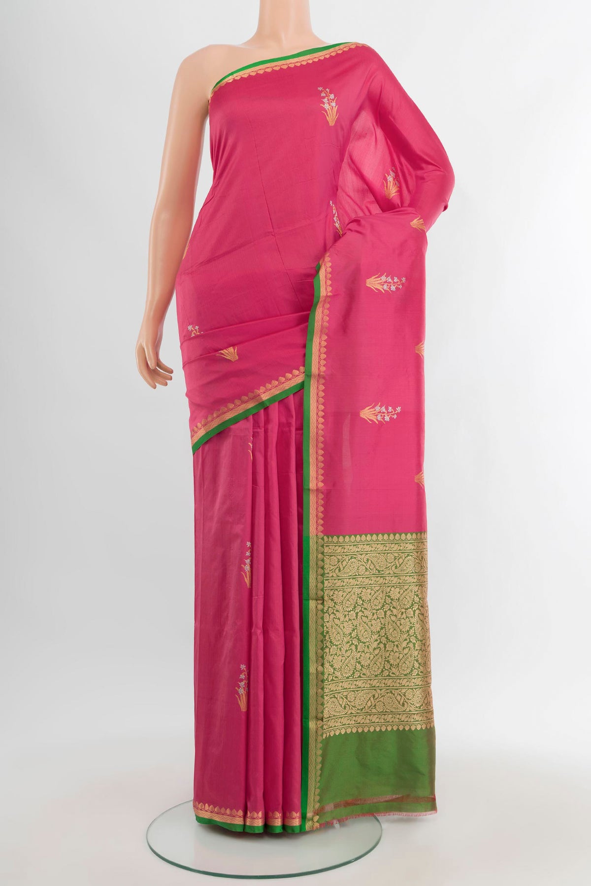Pink Banarasi Katan Silk Saree with Zari Butta on the body and Zari Border.  displayed on a mannequin