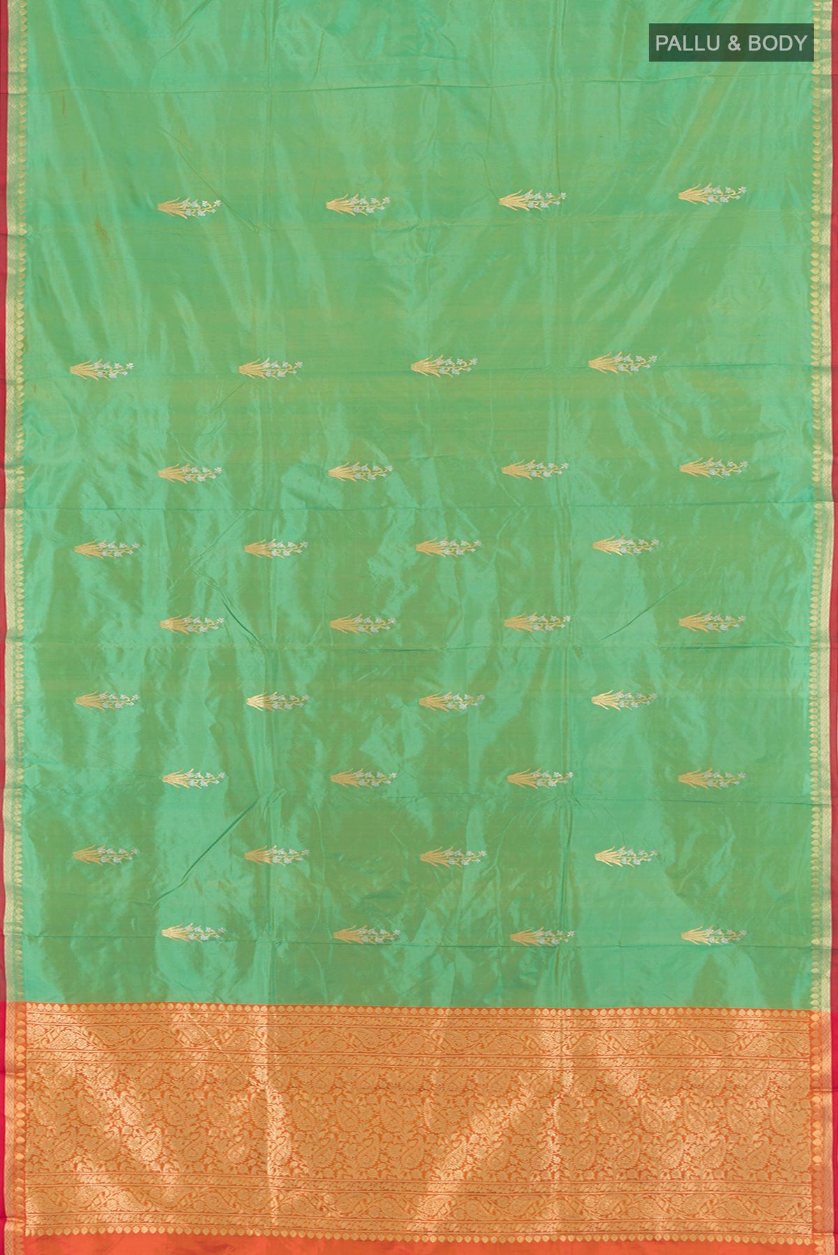 Flat view of Light Green Banarasi Katan Silk Saree with Zari Butta on the body and Zari Border. 