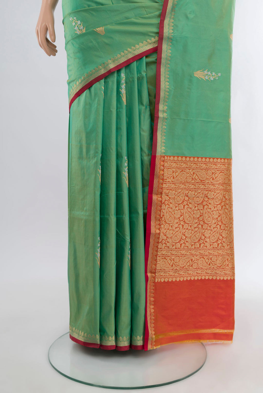 Pleats and pallu of Light Green Banarasi Katan Silk Saree with Zari Butta on the body and Zari Border. 