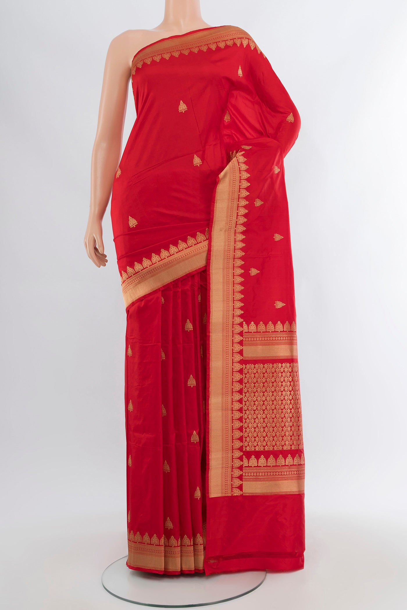 Red Banarasi Katan Silk Saree with Zari Butta on the body and Zari Border.  displayed on a mannequin