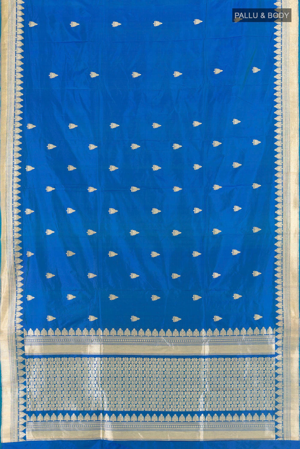 Flat view of Royal Blue Banarasi Katan Silk Saree with Zari Butta on the body and Fancy Border. 