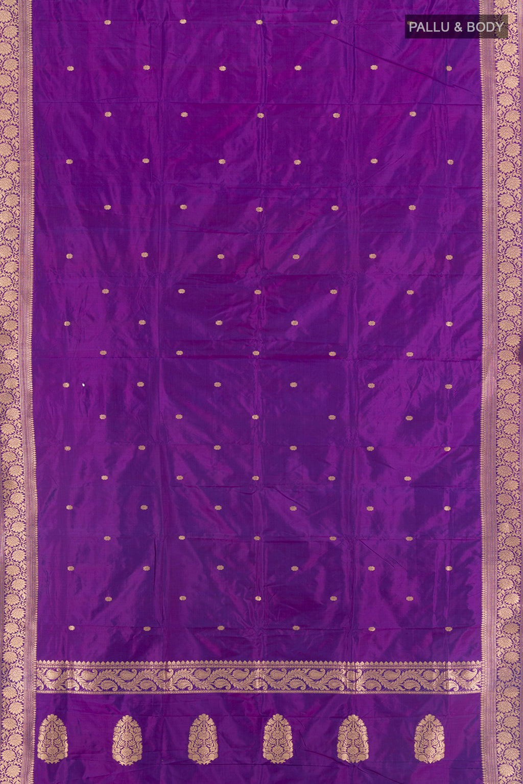 Flat view of Violet Banarasi Katan Silk Saree with Zari Butta on the body and Zari Border. 
