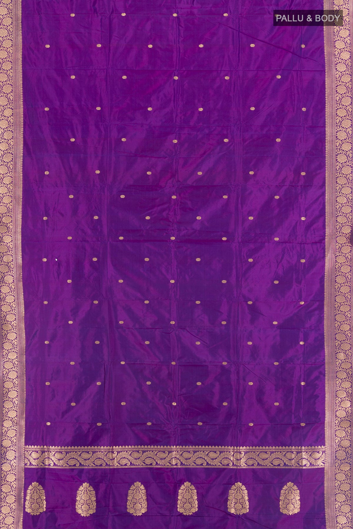Flat view of Violet Banarasi Katan Silk Saree with Zari Butta on the body and Zari Border. 