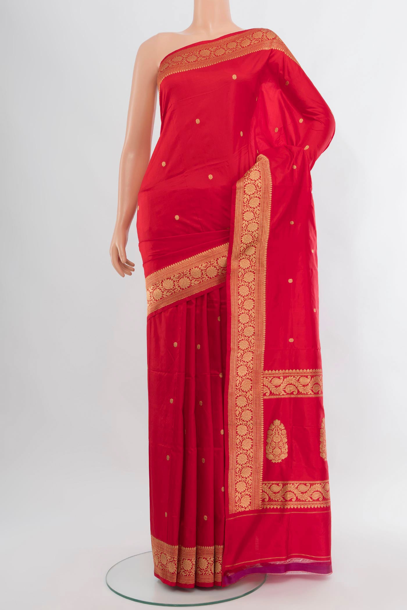 Red Banarasi Katan Silk Saree with Zari Butta on the body and Zari Border.  displayed on a mannequin