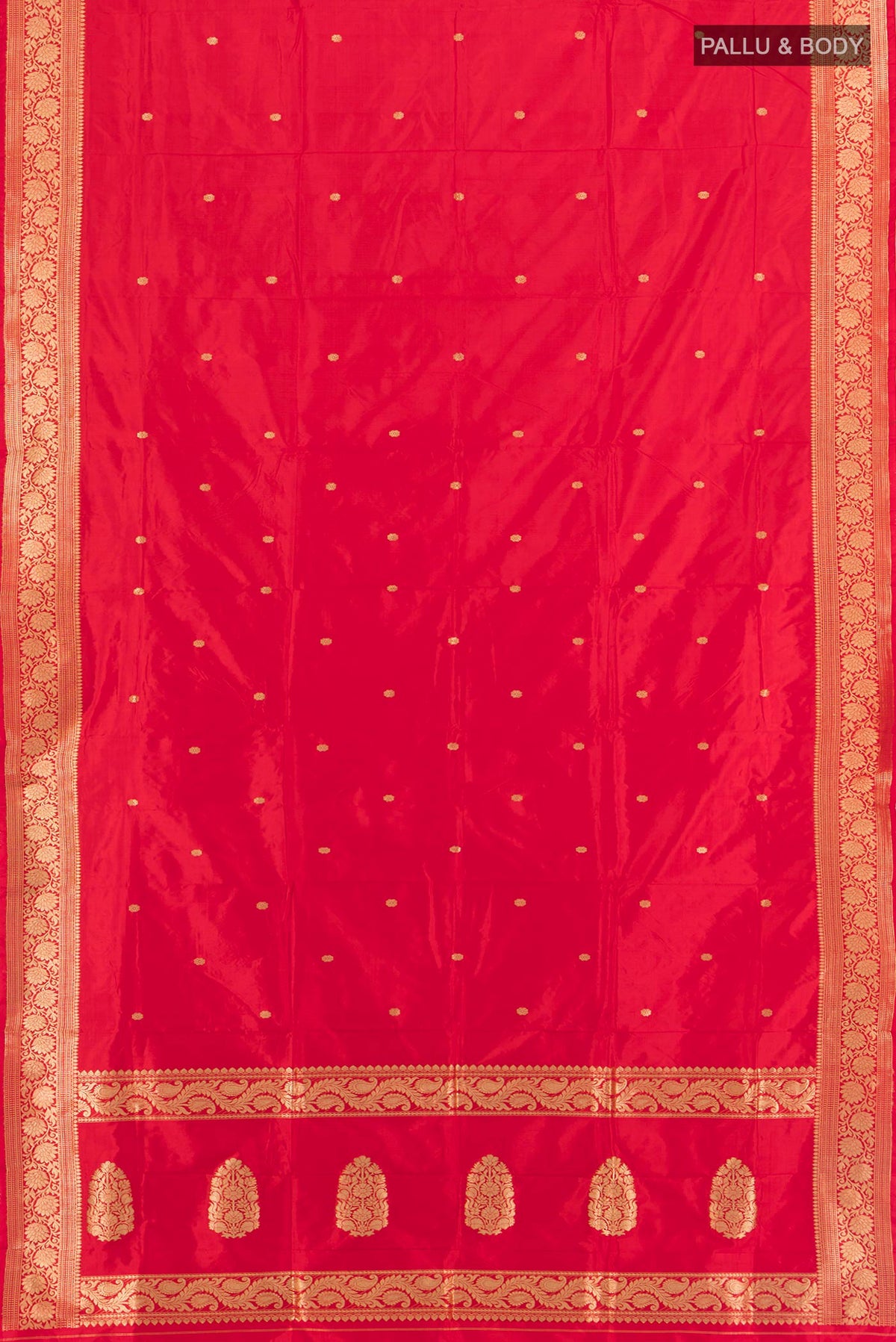 Flat view of Red Banarasi Katan Silk Saree with Zari Butta on the body and Zari Border. 