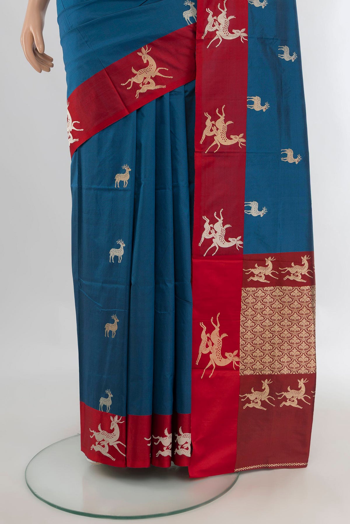 Pleats and pallu of Pure Silk Blue Banarasi Katan Saree with Zari Butta on the body and Plain Border. 