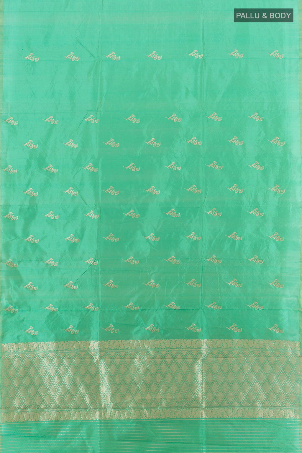 Flat view of Sea Green Banarasi Katan Silk Saree with Zari Butta on the body and Without Border. 