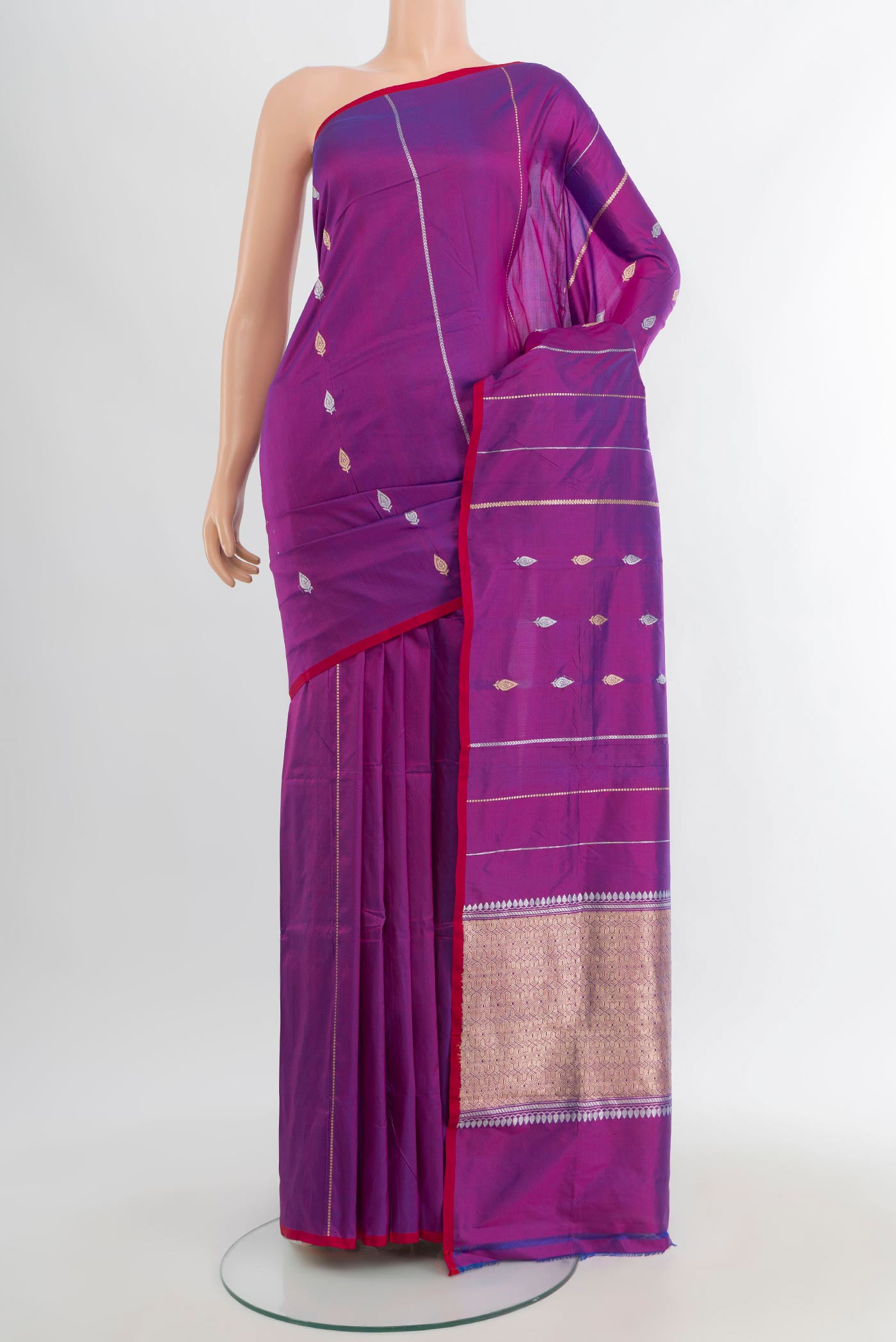 Purple Banarasi Katan Silk Saree with Zari Butta on the body and Without Border.  displayed on a mannequin