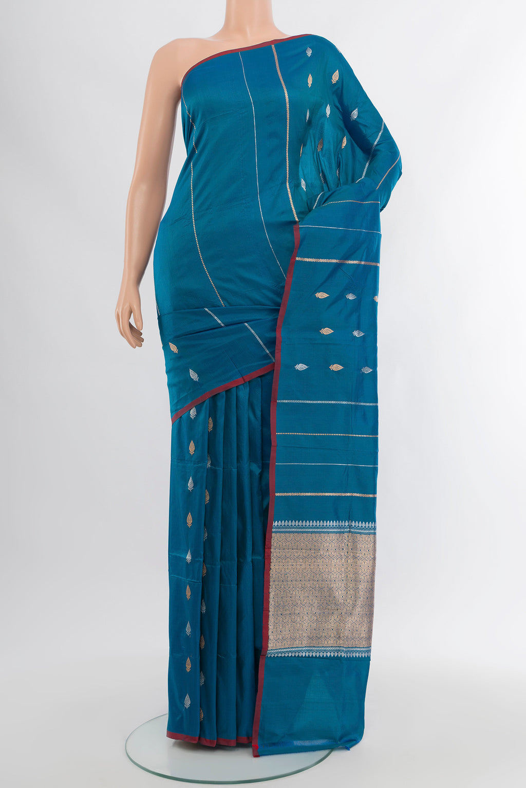 Blue Banarasi Katan Silk Saree with Stripes on the body and Without Border.  displayed on a mannequin