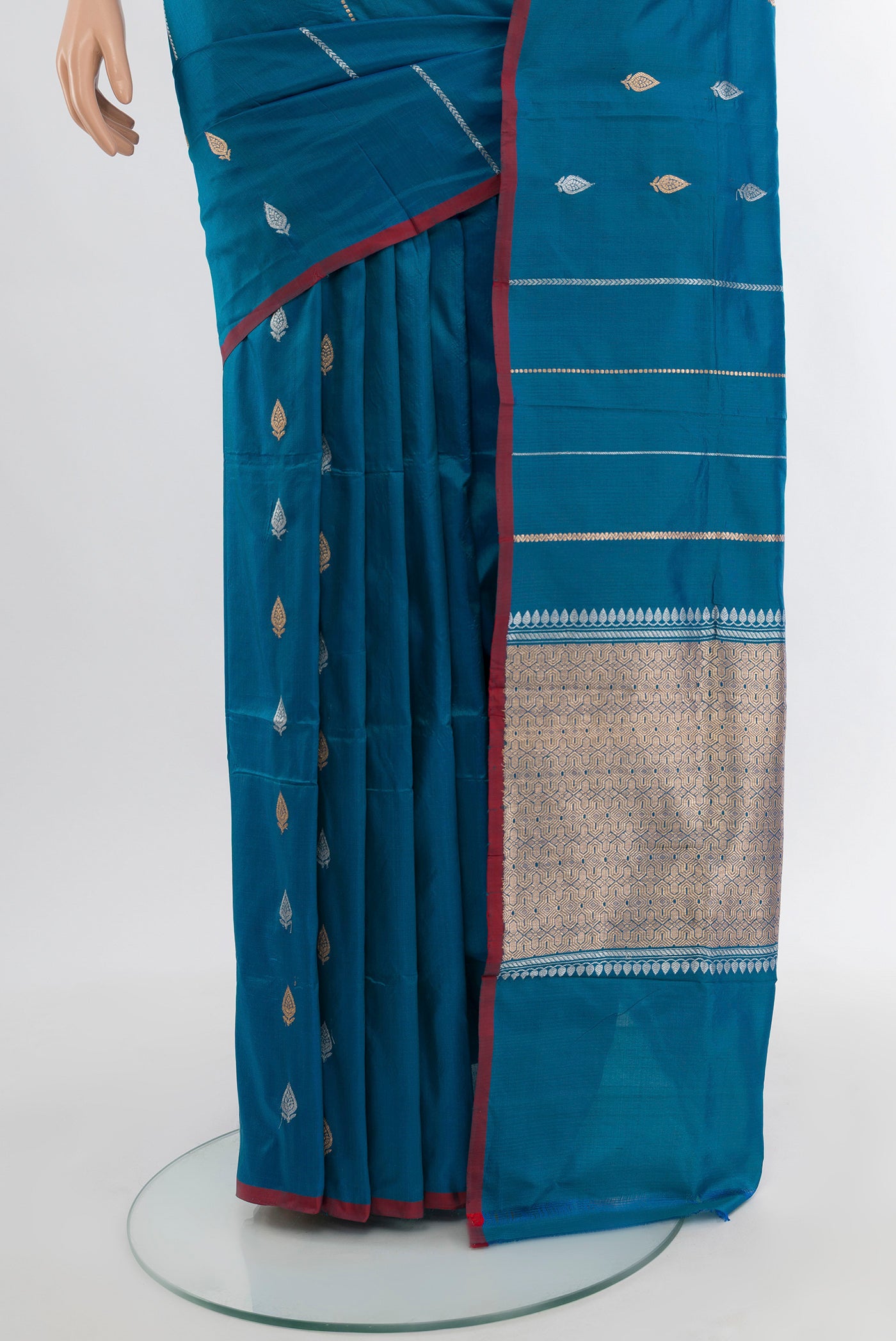 Pleats and pallu of Blue Banarasi Katan Silk Saree with Stripes on the body and Without Border. 