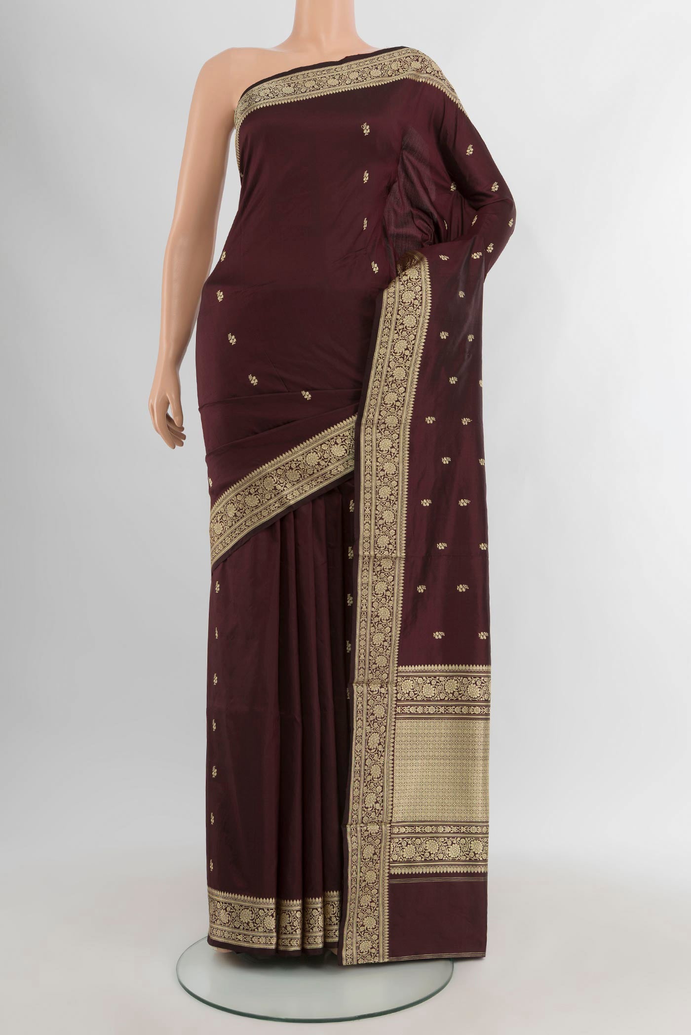 Coffee Brown Banarasi Katan Silk Saree with Thread Butta on the body and Thread Border.  displayed on a mannequin