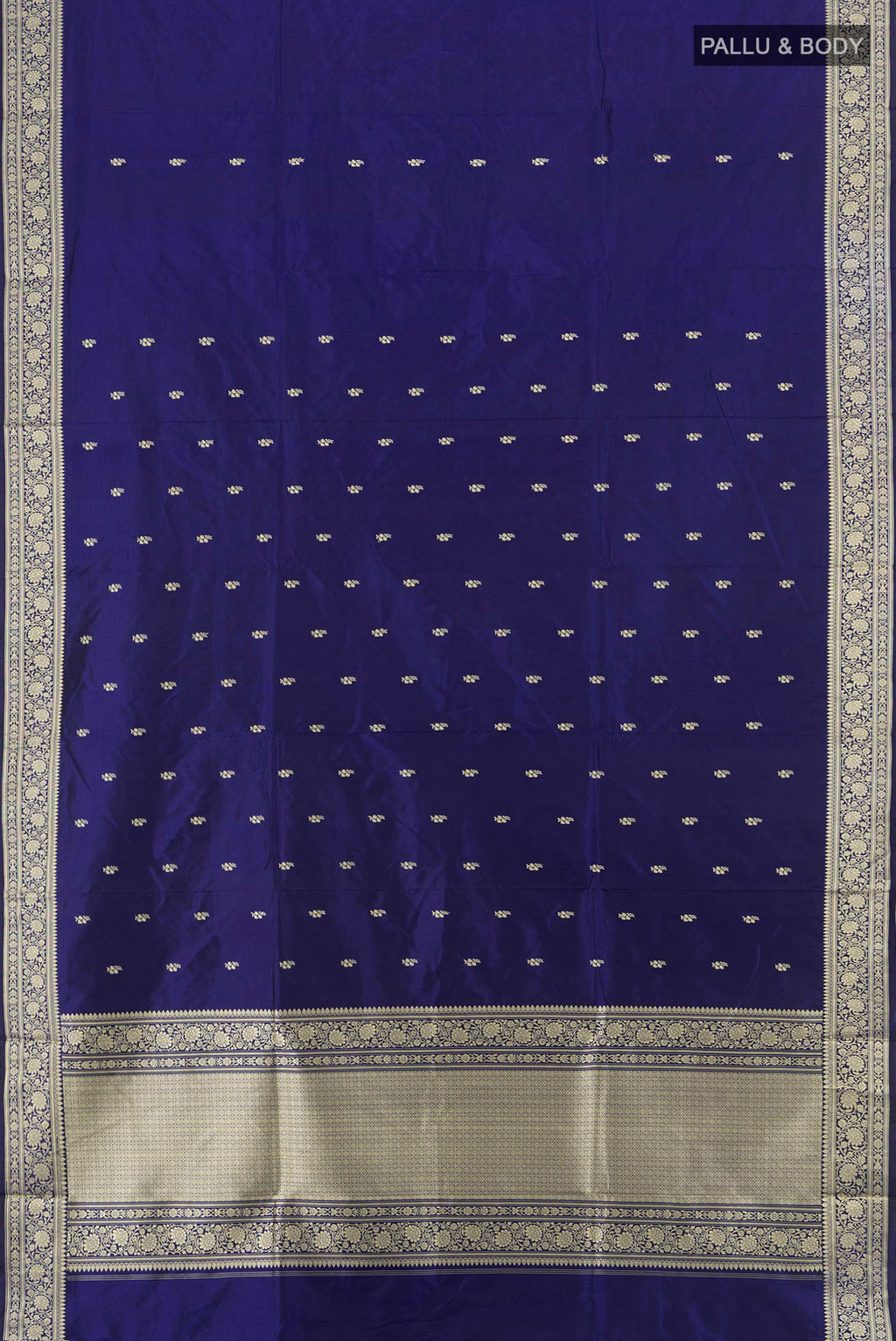 Flat view of Navy Blue Banarasi Katan Silk Saree with Thread Butta on the body and Thread Border. 