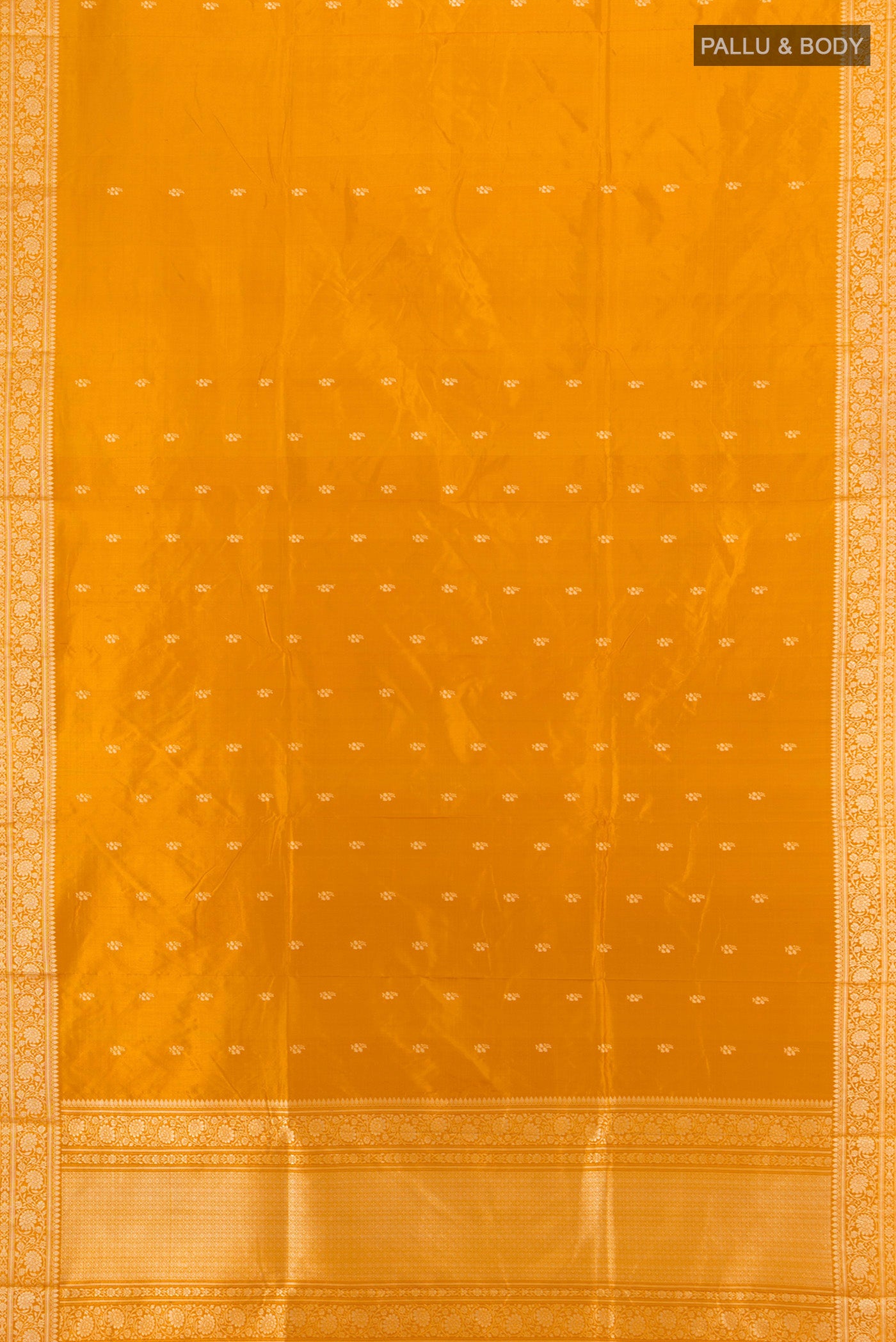 Flat view of Yellow Banarasi Katan Silk Saree with Zari Butta on the body and Silk Border. 