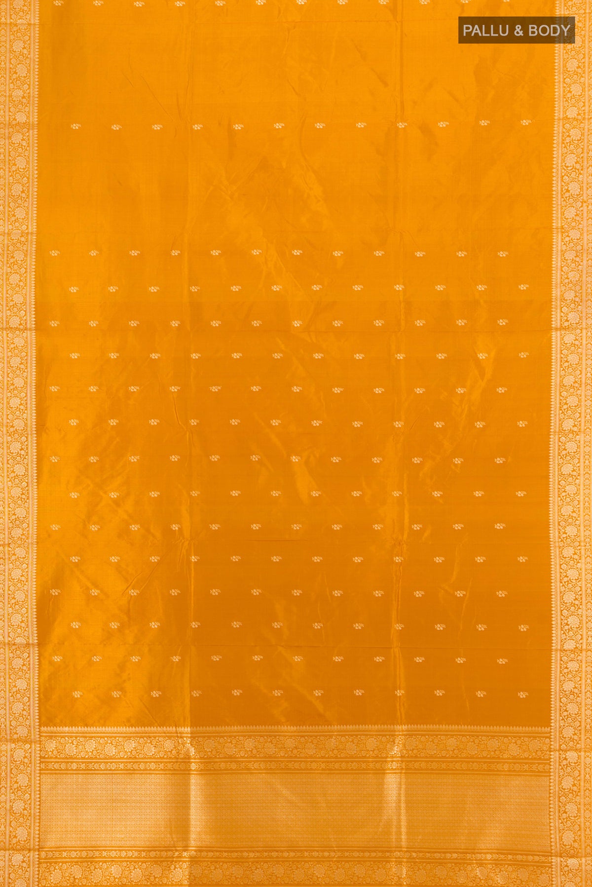 Flat view of Yellow Banarasi Katan Silk Saree with Zari Butta on the body and Silk Border. 