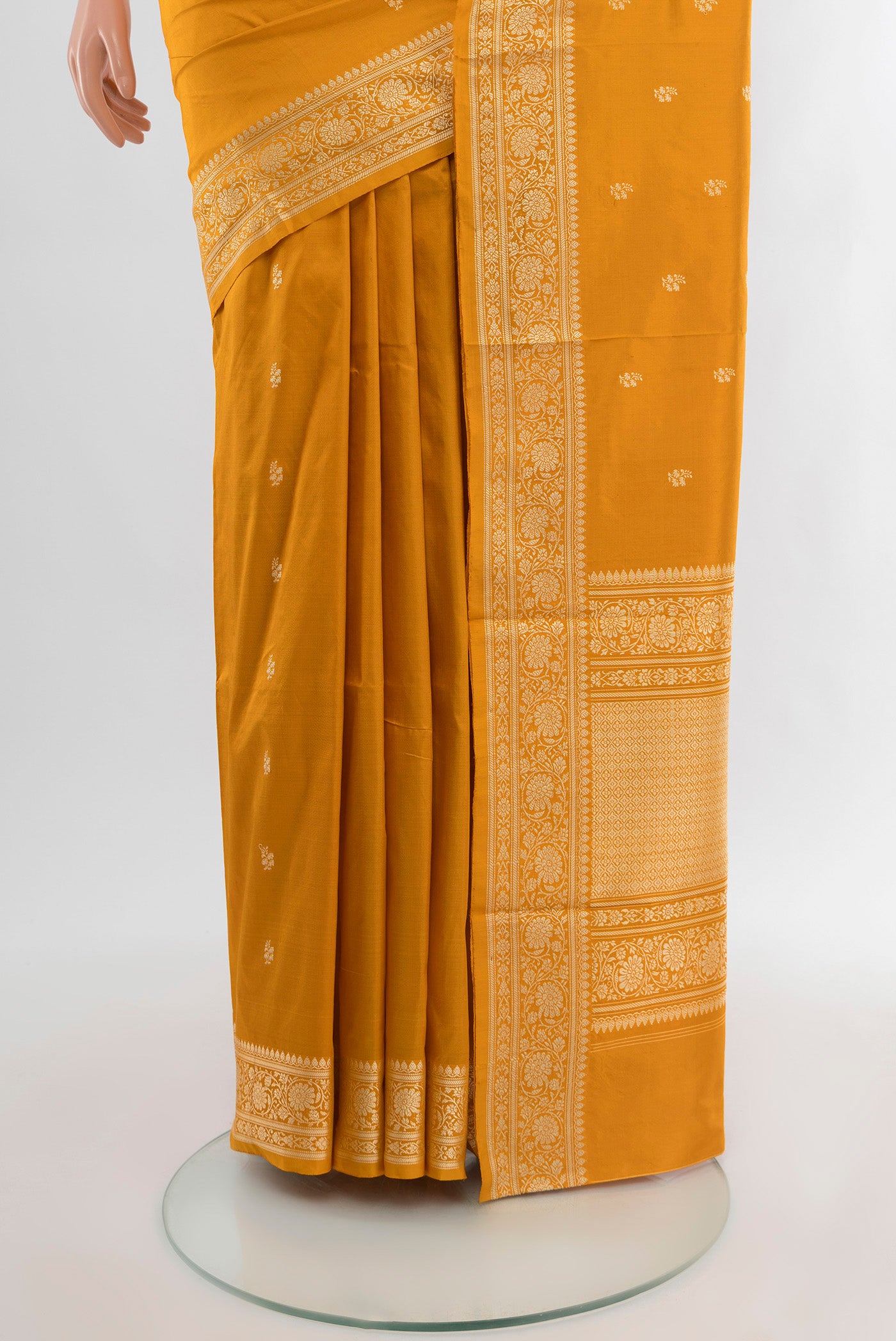 Pleats and pallu of Yellow Banarasi Katan Silk Saree with Zari Butta on the body and Silk Border. 