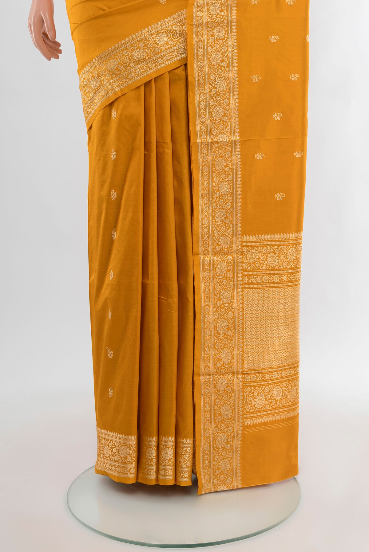 Pleats and pallu of Yellow Banarasi Katan Silk Saree with Zari Butta on the body and Silk Border. 