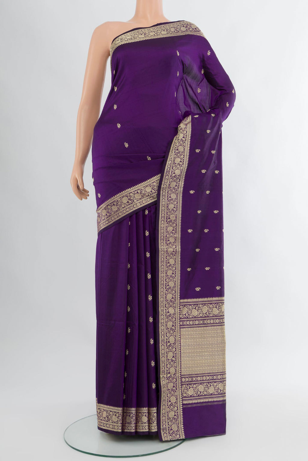 Violet Banarasi Katan Silk Saree with Thread Butta on the body and Thread Border.  displayed on a mannequin
