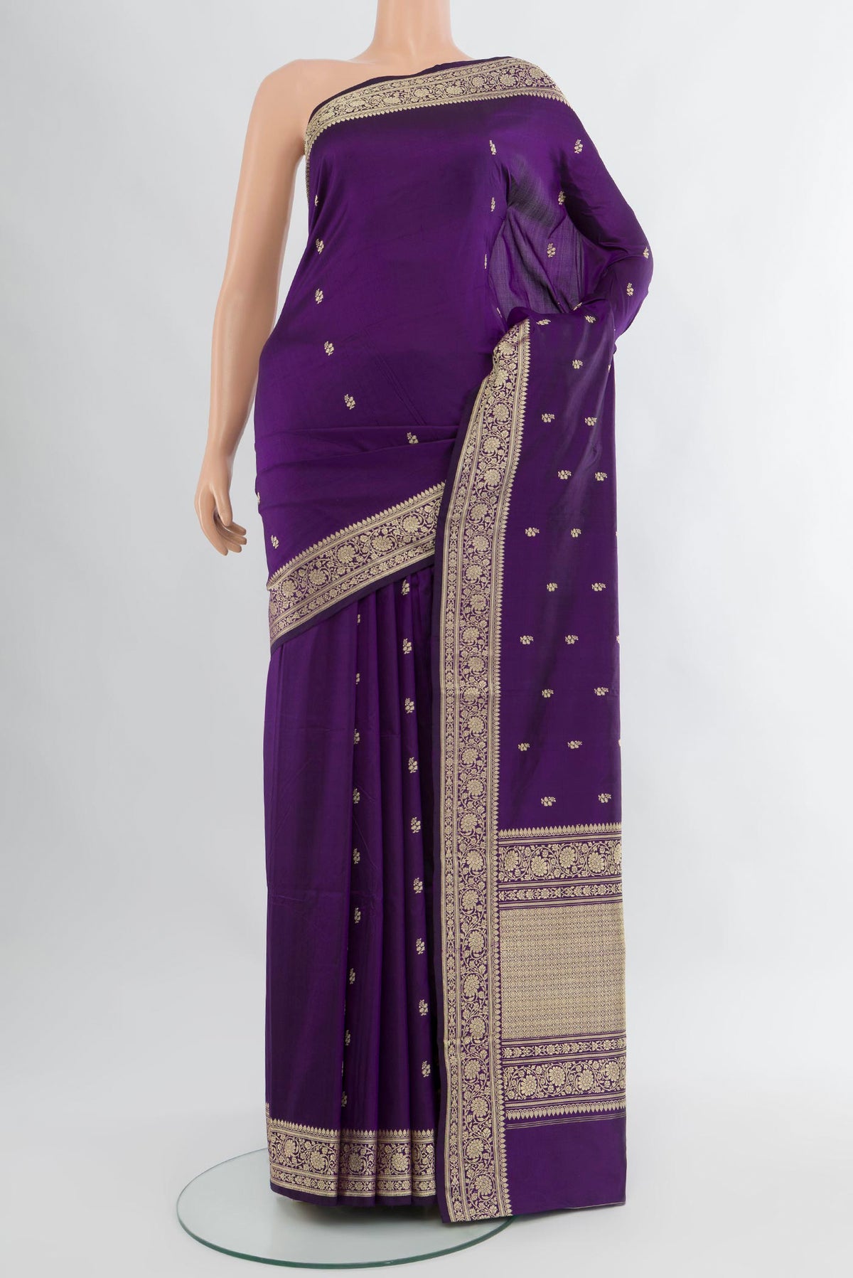 Violet Banarasi Katan Silk Saree with Thread Butta on the body and Thread Border.  displayed on a mannequin