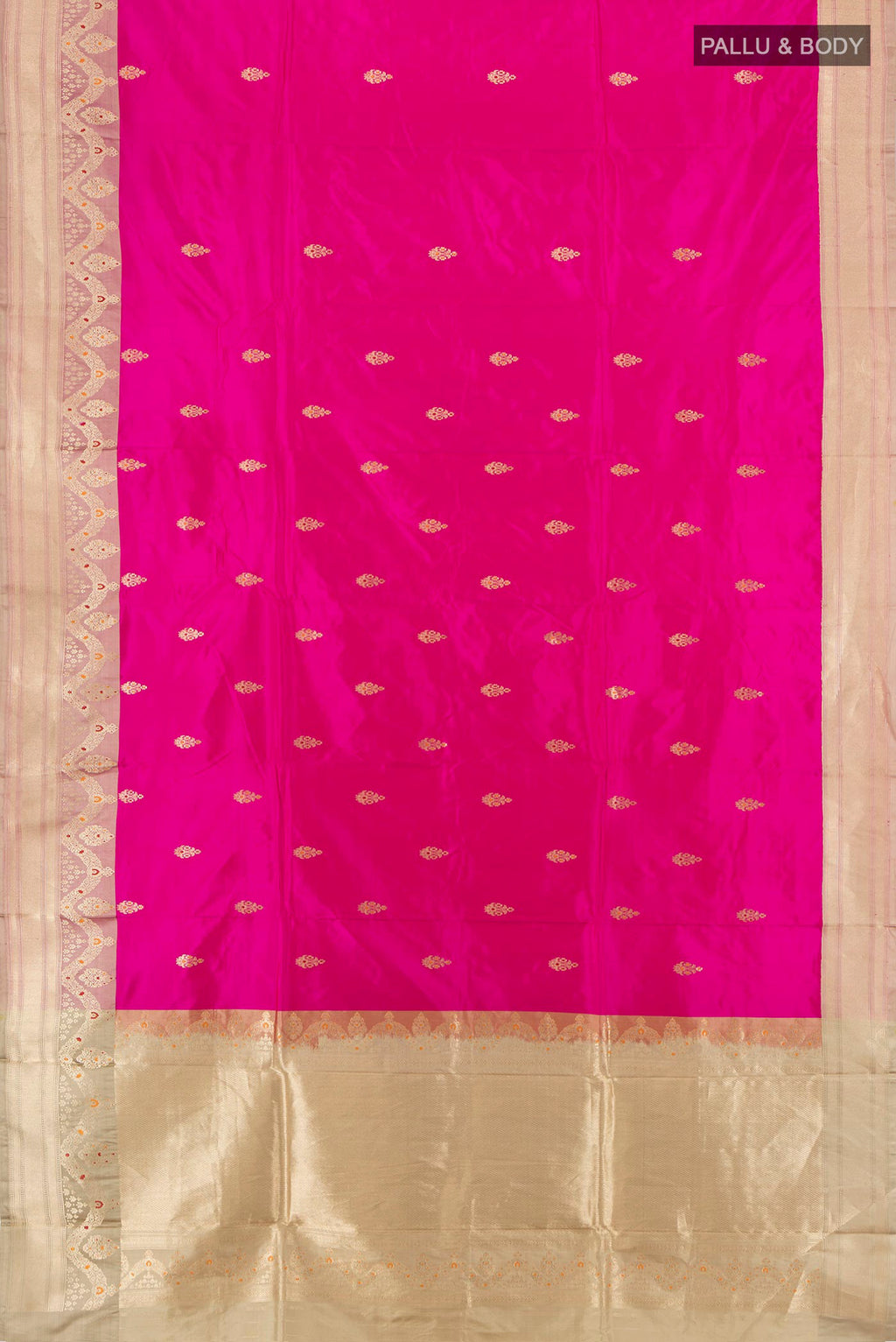 Flat view of Rani Pink Banarasi Katan Silk Saree with Zari Butta on the body and Zari Border. 