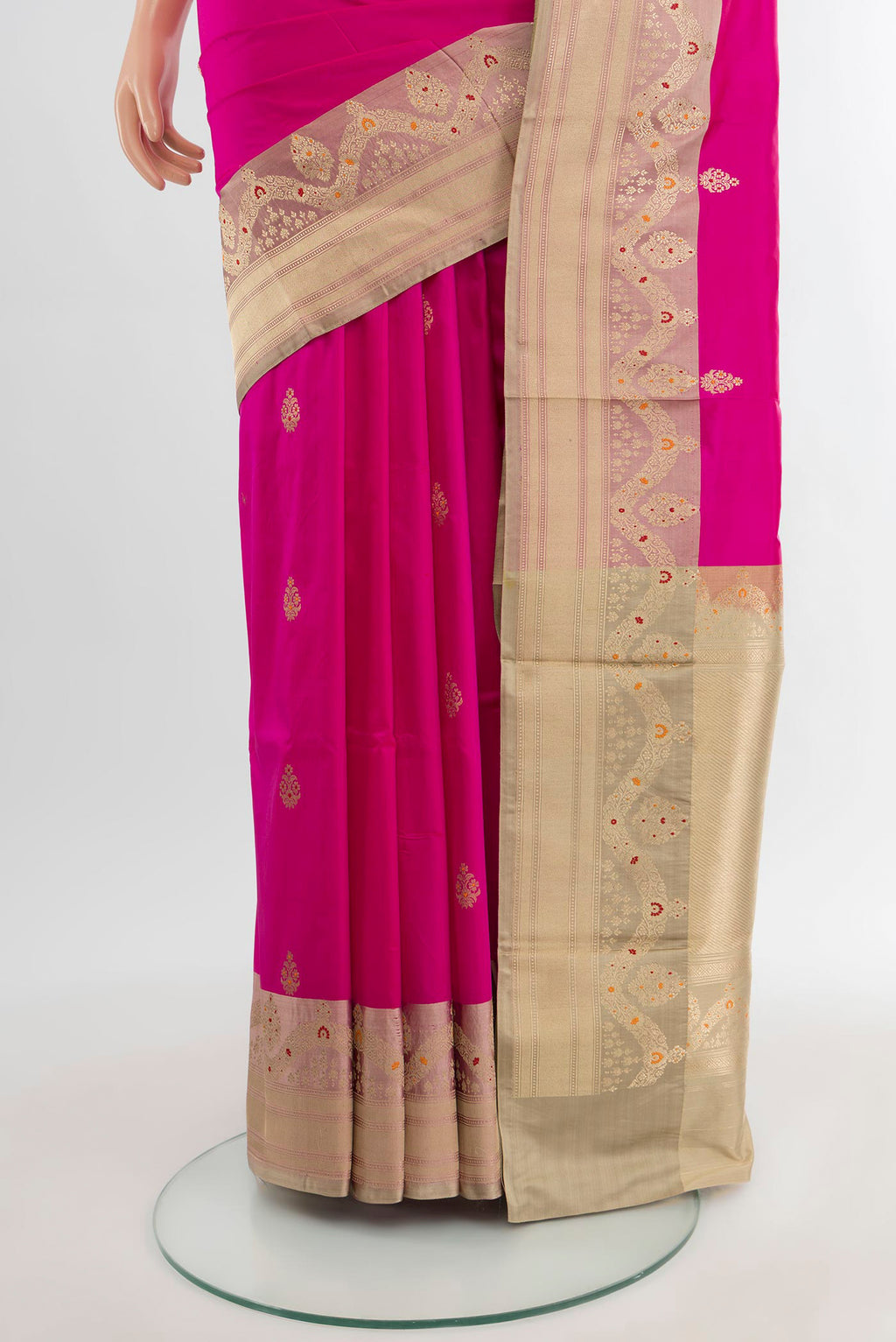 Pleats and pallu of Rani Pink Banarasi Katan Silk Saree with Zari Butta on the body and Zari Border. 