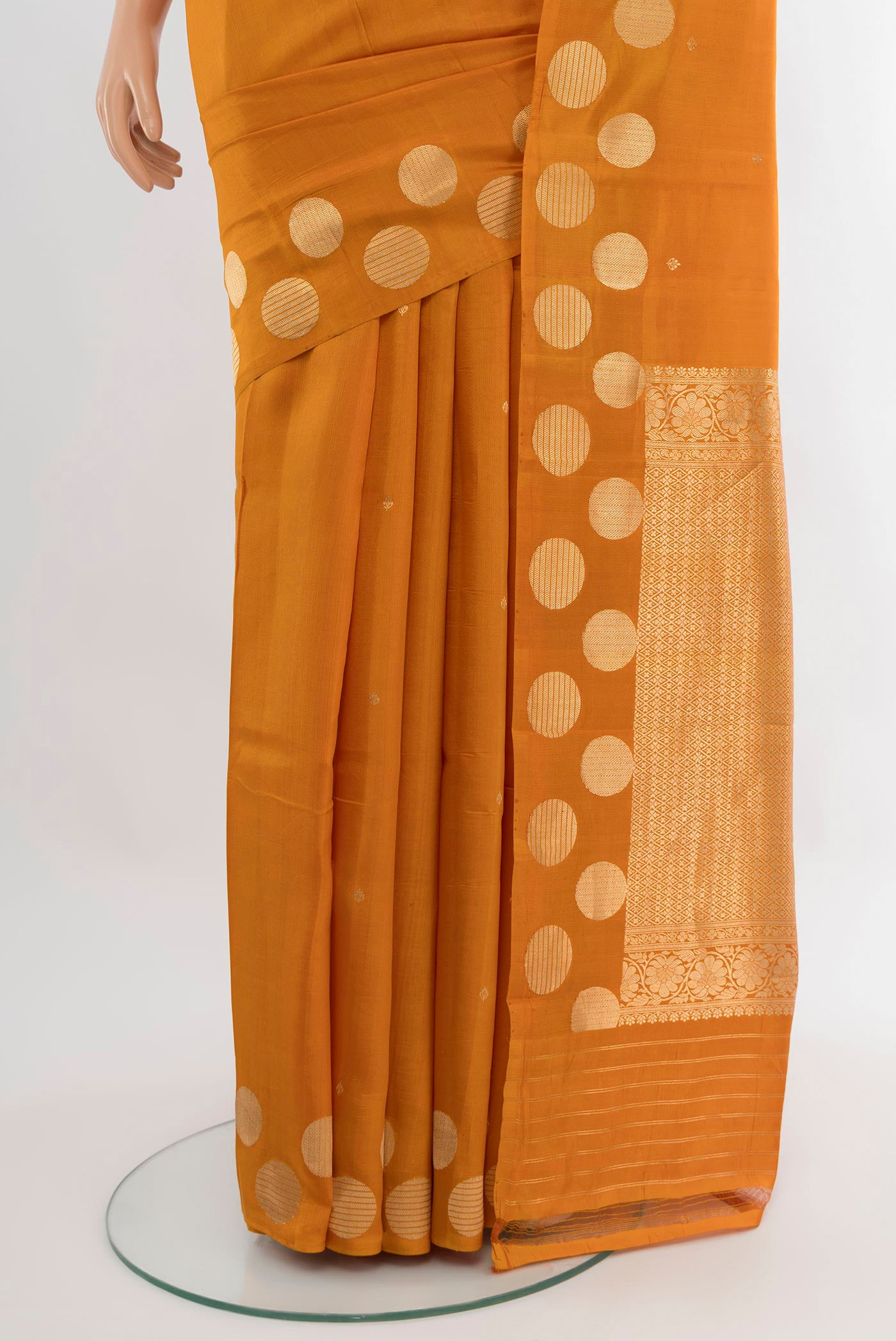 Pleats and pallu of Mustard Banarasi Katan Silk Saree with Zari Butta on the body and Without Border. 