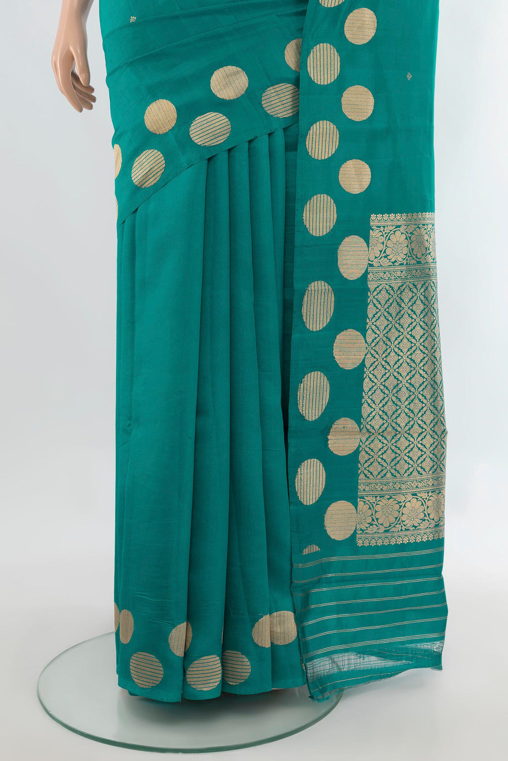 Pleats and pallu of Pure Silk Teal Banarasi Katan Saree with Zari Butta on the body and Fancy Border. 
