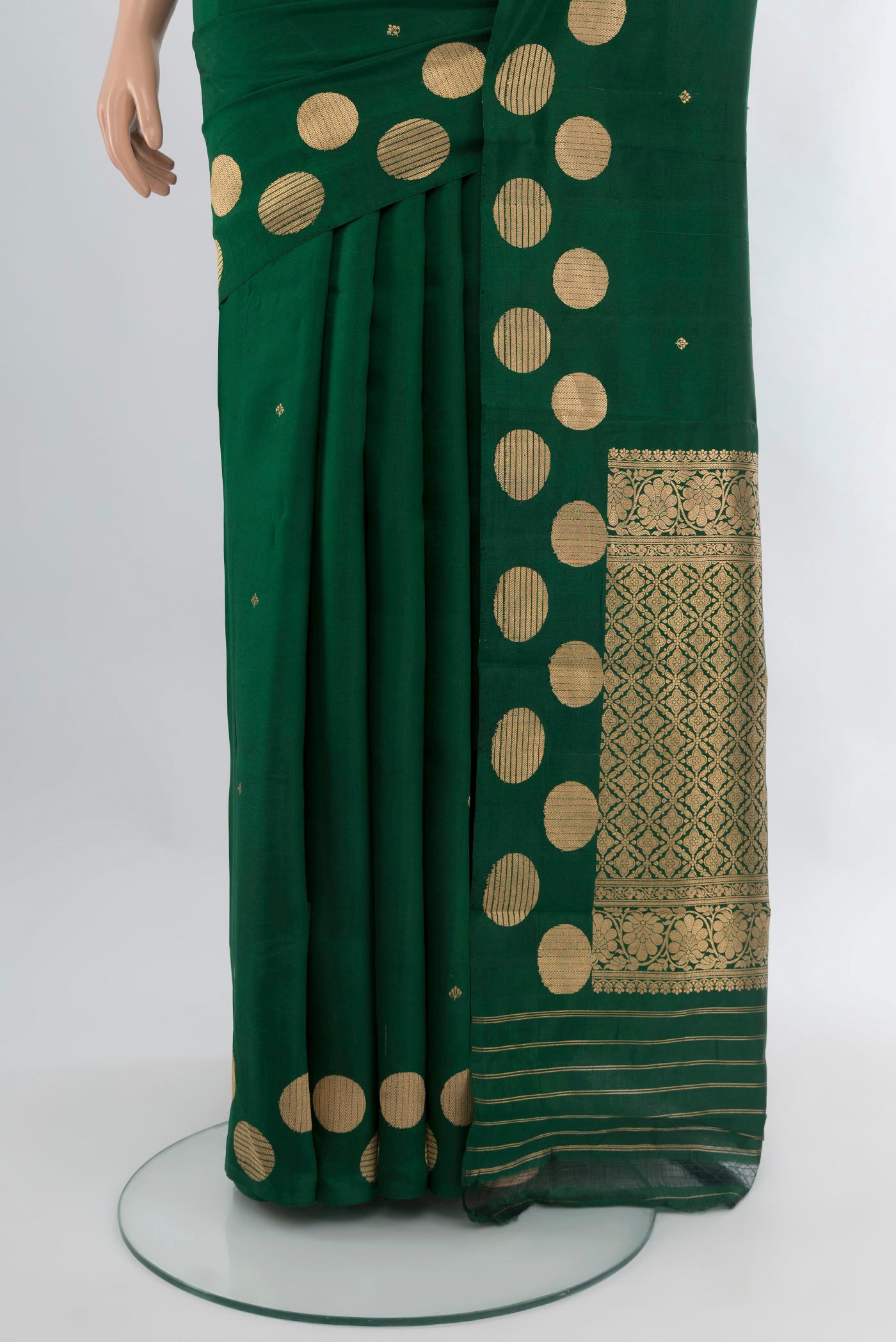 Pleats and pallu of Bottle Green Banarasi Katan Silk Saree with Zari Butta on the body and Fancy Border. 